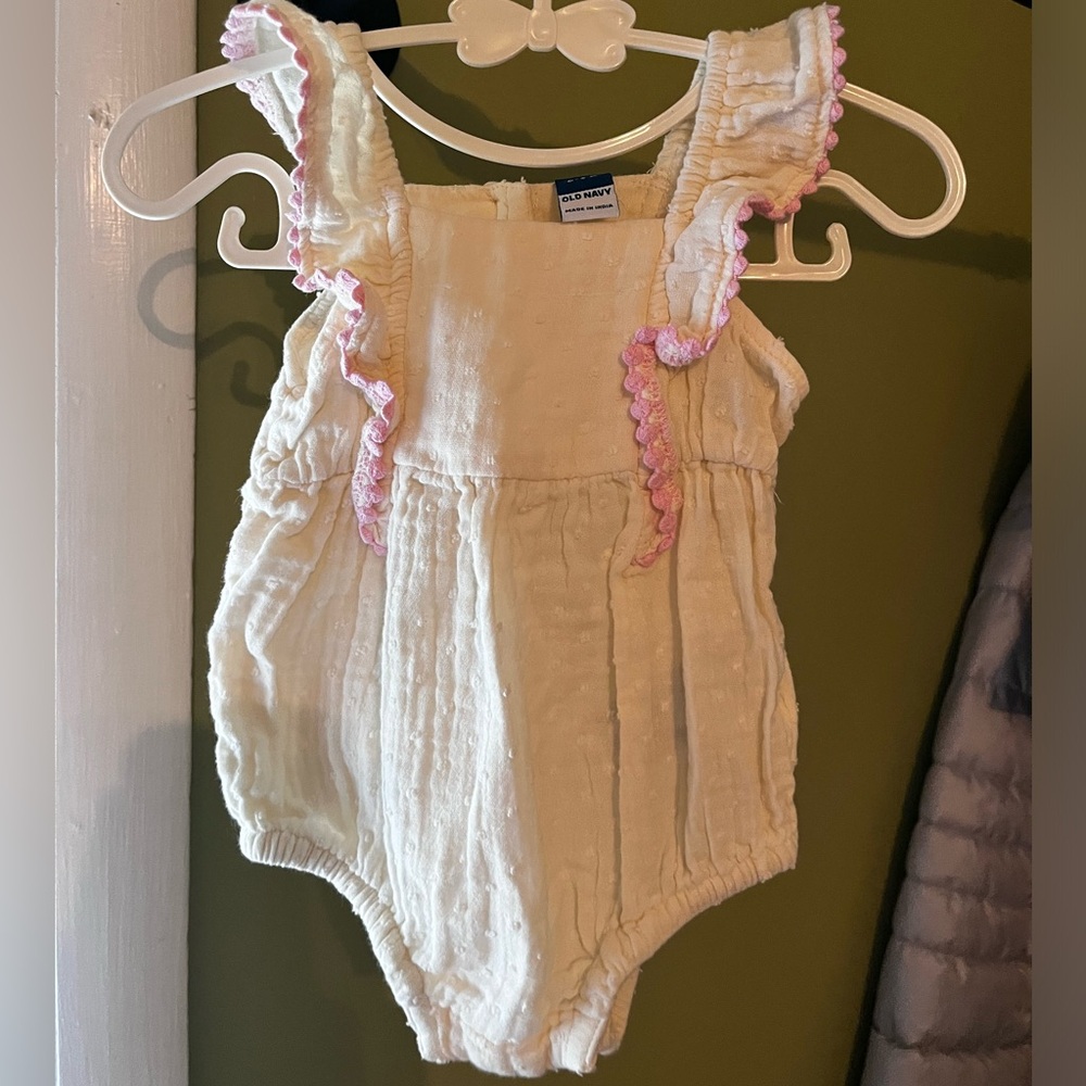 Old Navy one piece with pink ruffles